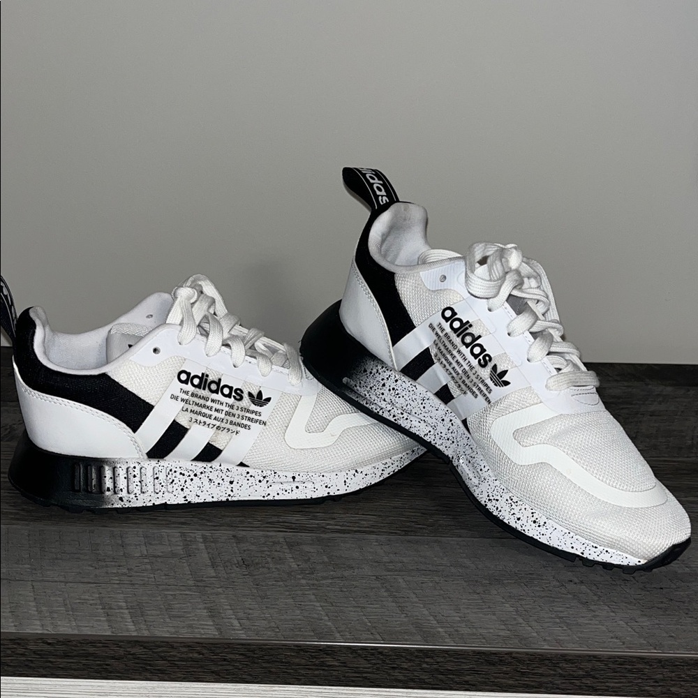 Adidas sneakers size 4.5 big kids (6/6.5 woman’s) worn once!